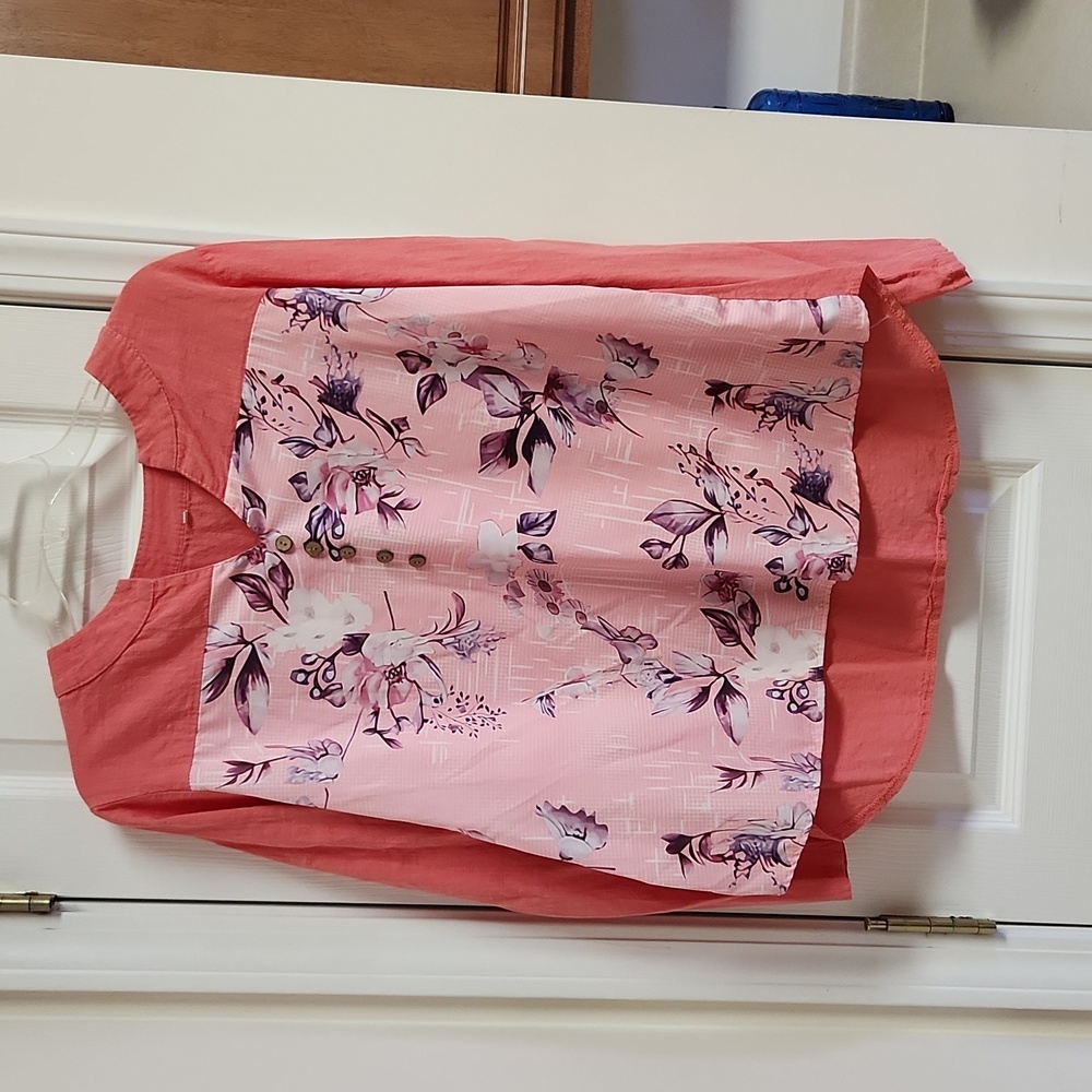 Coral and pink blouse.
